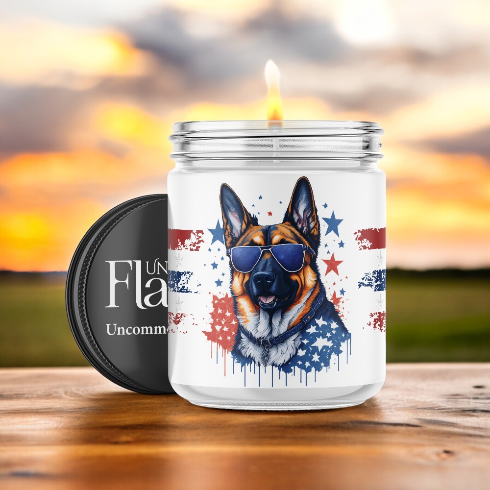 A candle with a patriotic German shepherd in red, white, and blue.