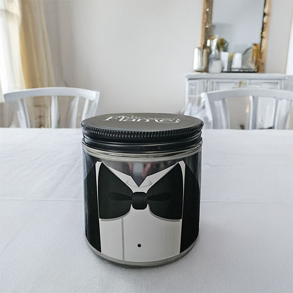 groom candle on plain table