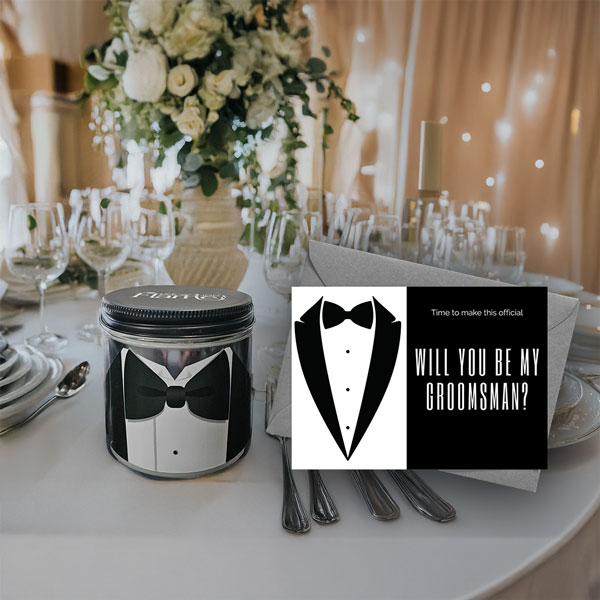groom candle with invitation